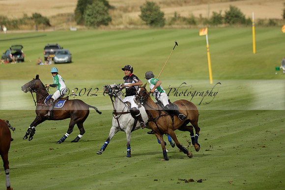 Jaeger Le Coultre (black)  v Wairakei Pastoral (white) in a Jaeger Le Coultre Holden White Cup polo match played on 29 July 2013 at Cowdray Park Polo Club on Brooksfieldwww.polopictures.co.uk