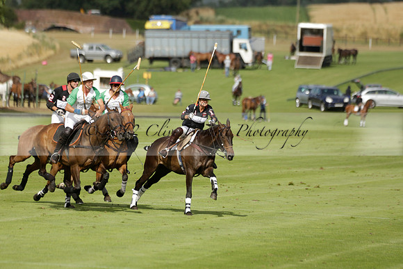 Jaeger Le Coultre (black)  v Wairakei Pastoral (white) in a Jaeger Le Coultre Holden White Cup polo match played on 29 July 2013 at Cowdray Park Polo Club on Brooksfieldwww.polopictures.co.uk