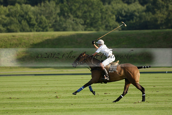 Pluma Negra (white) v Shoreline (black) in the Brecknock Cup Subsidiary final polo match played on Sunday 25 August 2013 at Cowdray Park Polo Club on Ambersham 1. 2013.10.12 www.polopictures.co.uk