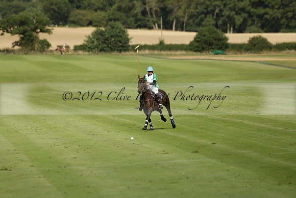 Jaeger Le Coultre (black)  v Wairakei Pastoral (white) in a Jaeger Le Coultre Holden White Cup polo match played on 29 July 2013 at Cowdray Park Polo Club on Brooksfieldwww.polopictures.co.uk