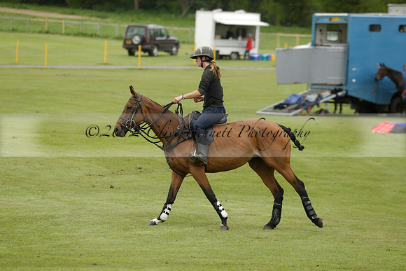Four Quarters Orange v Ferne Park  in a Dollar Cup Polo match 2013.05.13