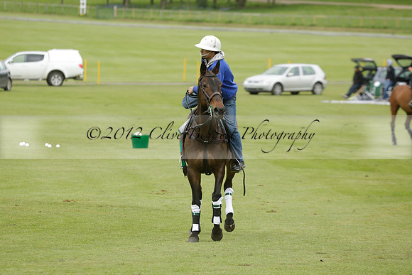Four Quarters Orange v Ferne Park  in a Dollar Cup Polo match 2013.05.13