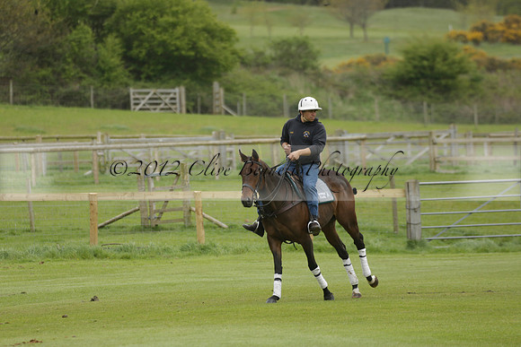 Four Quarters Orange v Ferne Park  in a Dollar Cup Polo match 2013.05.13