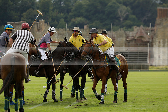 La Tremenda (lilac) v Maiz Dulce (yellow) in a Brecknock Cup polo match played on Lawns 1 at the Cowdray Park Polo Club on Tuesday 13 August 2013