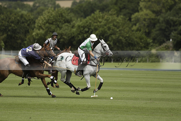 Burningfold (blue) v Wairakei Pastoral (green) in the Ruins Cup Final on Sunday 04 August 2013.