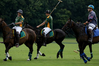 La Tremenda (mauve) v Maiz Dulce (green) in the Brecknock Cup  final polo match. Played at Cowdray Park Polo Club on Sunday 25 August 2013 on Ambersham 1. www.polopictures.co.uk