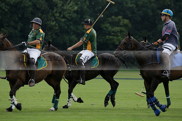 La Tremenda (mauve) v Maiz Dulce (green) in the Brecknock Cup  final polo match. Played at Cowdray Park Polo Club on Sunday 25 August 2013 on Ambersham 1. www.polopictures.co.uk