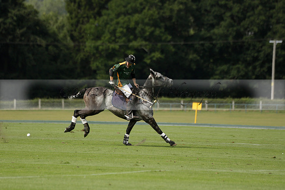 Maiz Dulce (green) v River (blue) in a Uber Polo Midsummer 12 goal polo match on Wednesday 21 August 2013 at Cowdray park Polo Club on Ambersham 2.  www.polopictures.co.uk