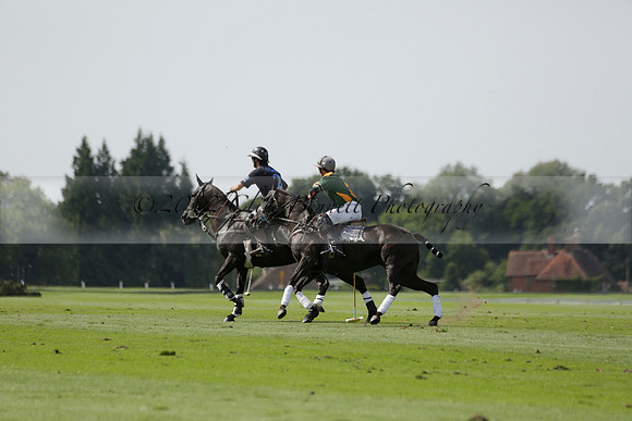 Maiz Dulce (green) v River (blue) in a Uber Polo Midsummer 12 goal polo match on Wednesday 21 August 2013 at Cowdray park Polo Club on Ambersham 2.  www.polopictures.co.uk