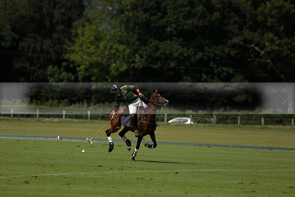 Maiz Dulce (green) v River (blue) in a Uber Polo Midsummer 12 goal polo match on Wednesday 21 August 2013 at Cowdray park Polo Club on Ambersham 2.  www.polopictures.co.uk
