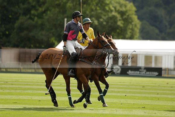 La Tremenda (lilac) v Maiz Dulce (yellow) in a Brecknock Cup polo match played on Lawns 1 at the Cowdray Park Polo Club on Tuesday 13 August 2013