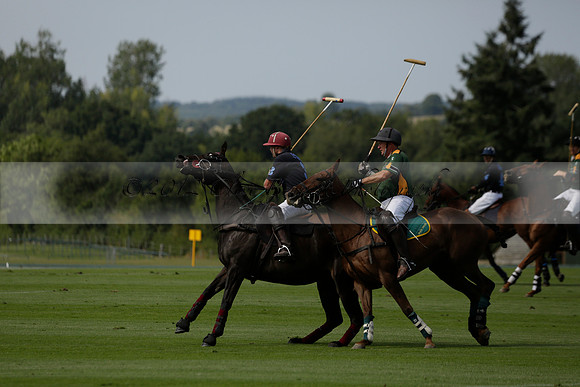Maiz Dulce (green) v River (blue) in a Uber Polo Midsummer 12 goal polo match on Wednesday 21 August 2013 at Cowdray park Polo Club on Ambersham 2.  www.polopictures.co.uk