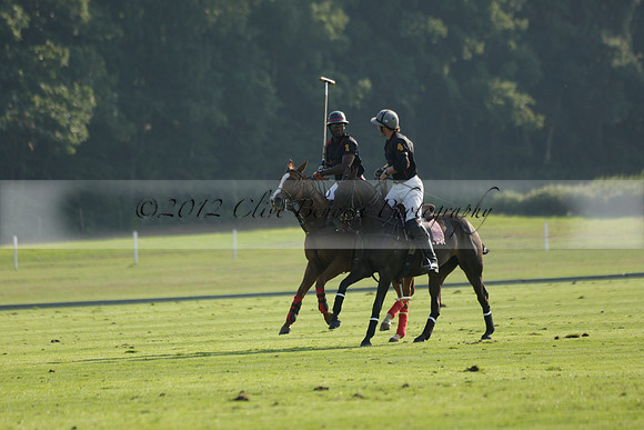 Pluma Negra (white) v Shoreline (black) in the Brecknock Cup Subsidiary final polo match played on Sunday 25 August 2013 at Cowdray Park Polo Club on Ambersham 1. 2013.10.12 www.polopictures.co.uk