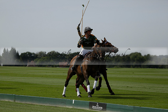 Maiz Dulce (green) v River (blue) in a Uber Polo Midsummer 12 goal polo match on Wednesday 21 August 2013 at Cowdray park Polo Club on Ambersham 2.  www.polopictures.co.uk