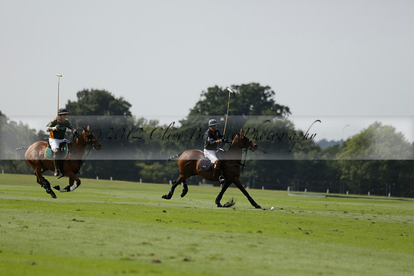 Maiz Dulce (green) v River (blue) in a Uber Polo Midsummer 12 goal polo match on Wednesday 21 August 2013 at Cowdray park Polo Club on Ambersham 2.  www.polopictures.co.uk