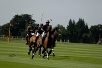 Maiz Dulce (green) v River (blue) in a Uber Polo Midsummer 12 goal polo match on Wednesday 21 August 2013 at Cowdray park Polo Club on Ambersham 2.  www.polopictures.co.uk