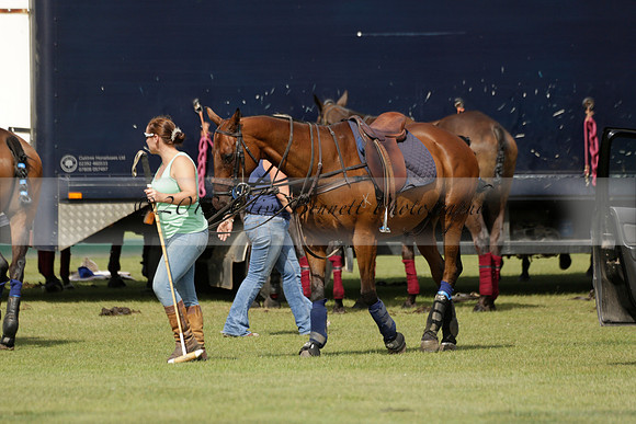 Maiz Dulce (green) v River (blue) in a Uber Polo Midsummer 12 goal polo match on Wednesday 21 August 2013 at Cowdray park Polo Club on Ambersham 2.  www.polopictures.co.uk