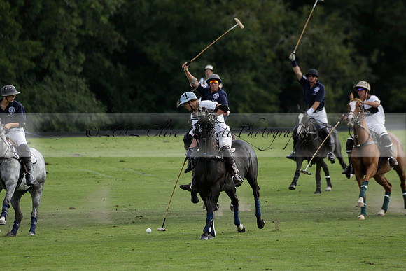 Pandas (white) v Home Farm (navy) in a Park House West Sussex Cup Polo match on Brooksfield at Cowdray Park Polo Club on Friday 30 August 2013. 2013.08.30 www.polopictures.co.uk
