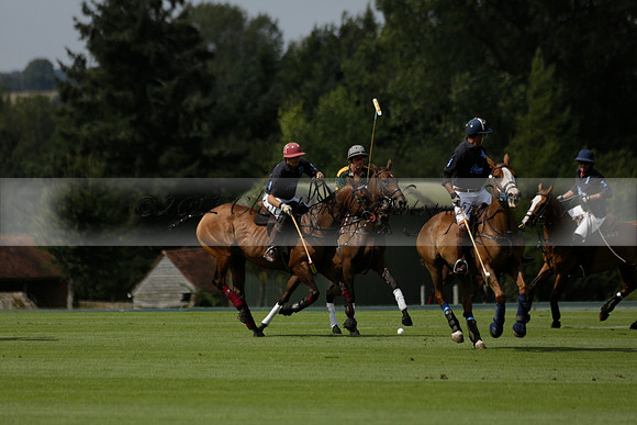 Maiz Dulce (green) v River (blue) in a Uber Polo Midsummer 12 goal polo match on Wednesday 21 August 2013 at Cowdray park Polo Club on Ambersham 2.  www.polopictures.co.uk