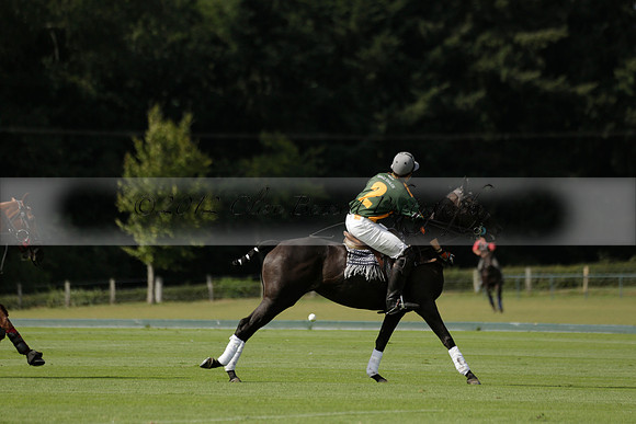 Maiz Dulce (green) v River (blue) in a Uber Polo Midsummer 12 goal polo match on Wednesday 21 August 2013 at Cowdray park Polo Club on Ambersham 2.  www.polopictures.co.uk