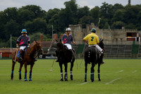 La Tremenda (lilac) v Maiz Dulce (yellow) in a Brecknock Cup polo match played on Lawns 1 at the Cowdray Park Polo Club on Tuesday 13 August 2013