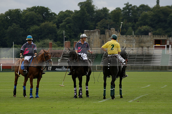 La Tremenda (lilac) v Maiz Dulce (yellow) in a Brecknock Cup polo match played on Lawns 1 at the Cowdray Park Polo Club on Tuesday 13 August 2013