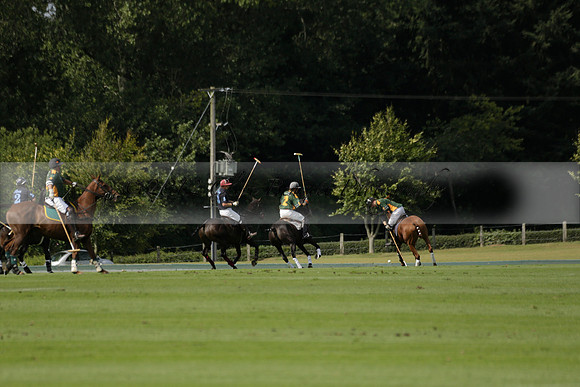 Maiz Dulce (green) v River (blue) in a Uber Polo Midsummer 12 goal polo match on Wednesday 21 August 2013 at Cowdray park Polo Club on Ambersham 2.  www.polopictures.co.uk
