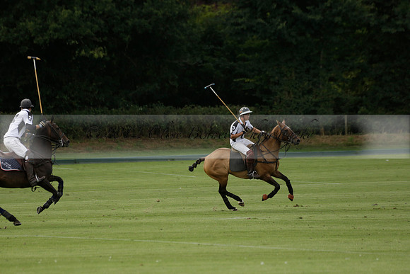 Beau Design v Boscom in an August Rother Cup 4 goal polo match at Cowdray Park Polo Club on Wednesday 07 August 2013