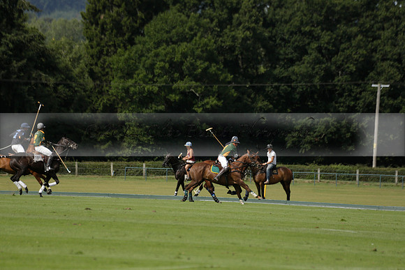 Maiz Dulce (green) v River (blue) in a Uber Polo Midsummer 12 goal polo match on Wednesday 21 August 2013 at Cowdray park Polo Club on Ambersham 2.  www.polopictures.co.uk