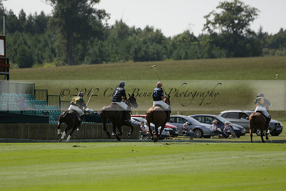 Maiz Dulce (green) v River (blue) in a Uber Polo Midsummer 12 goal polo match on Wednesday 21 August 2013 at Cowdray park Polo Club on Ambersham 2.  www.polopictures.co.uk