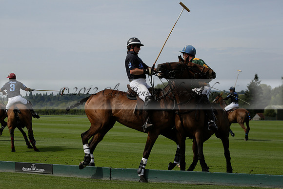 Maiz Dulce (green) v River (blue) in a Uber Polo Midsummer 12 goal polo match on Wednesday 21 August 2013 at Cowdray park Polo Club on Ambersham 2.  www.polopictures.co.uk
