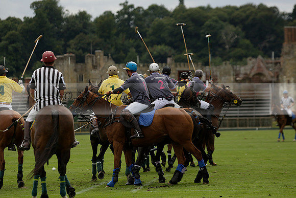 La Tremenda (lilac) v Maiz Dulce (yellow) in a Brecknock Cup polo match played on Lawns 1 at the Cowdray Park Polo Club on Tuesday 13 August 2013