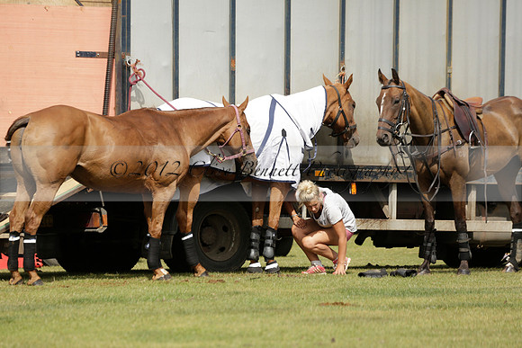 Maiz Dulce (green) v River (blue) in a Uber Polo Midsummer 12 goal polo match on Wednesday 21 August 2013 at Cowdray park Polo Club on Ambersham 2.  www.polopictures.co.uk