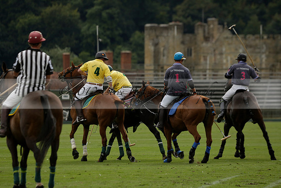 La Tremenda (lilac) v Maiz Dulce (yellow) in a Brecknock Cup polo match played on Lawns 1 at the Cowdray Park Polo Club on Tuesday 13 August 2013