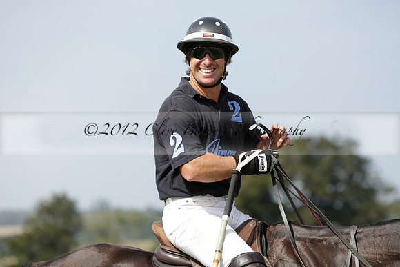 Maiz Dulce (green) v River (blue) in a Uber Polo Midsummer 12 goal polo match on Wednesday 21 August 2013 at Cowdray park Polo Club on Ambersham 2.  www.polopictures.co.uk