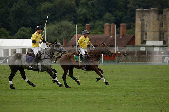 La Tremenda (lilac) v Maiz Dulce (yellow) in a Brecknock Cup polo match played on Lawns 1 at the Cowdray Park Polo Club on Tuesday 13 August 2013
