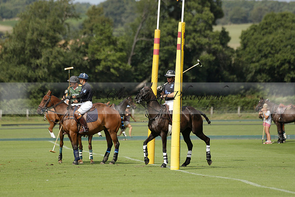 Maiz Dulce (green) v River (blue) in a Uber Polo Midsummer 12 goal polo match on Wednesday 21 August 2013 at Cowdray park Polo Club on Ambersham 2.  www.polopictures.co.uk
