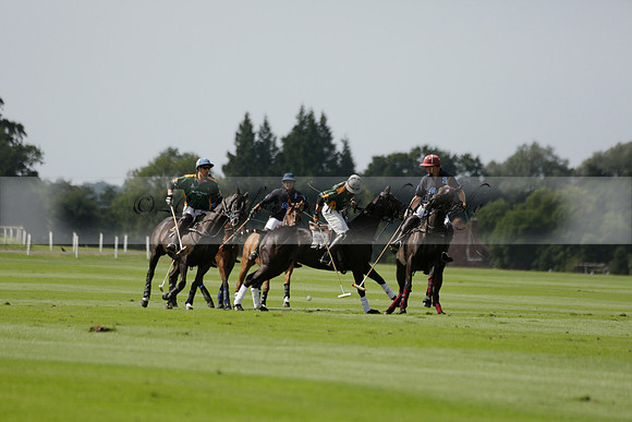Maiz Dulce (green) v River (blue) in a Uber Polo Midsummer 12 goal polo match on Wednesday 21 August 2013 at Cowdray park Polo Club on Ambersham 2.  www.polopictures.co.uk