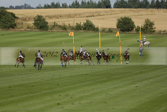 Jaeger Le Coultre (black)  v Wairakei Pastoral (white) in a Jaeger Le Coultre Holden White Cup polo match played on 29 July 2013 at Cowdray Park Polo Club on Brooksfieldwww.polopictures.co.uk