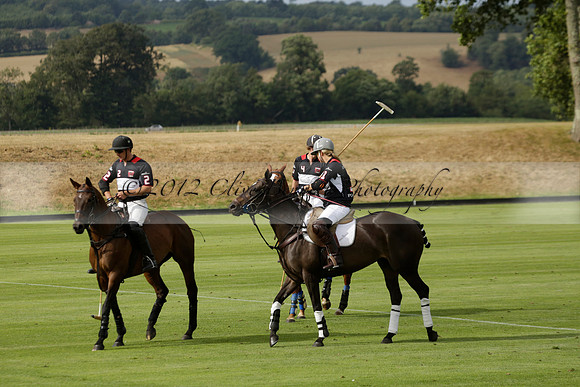 Jaeger Le Coultre (black)  v Wairakei Pastoral (white) in a Jaeger Le Coultre Holden White Cup polo match played on 29 July 2013 at Cowdray Park Polo Club on Brooksfieldwww.polopictures.co.uk