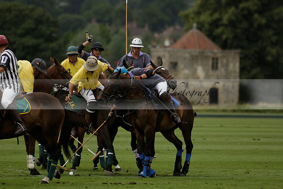 La Tremenda (lilac) v Maiz Dulce (yellow) in a Brecknock Cup polo match played on Lawns 1 at the Cowdray Park Polo Club on Tuesday 13 August 2013