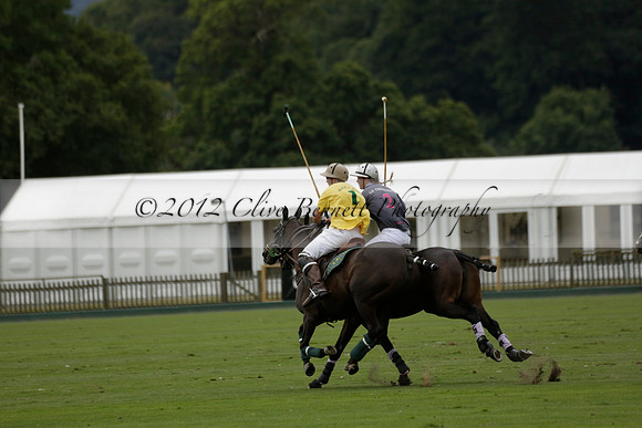 La Tremenda (lilac) v Maiz Dulce (yellow) in a Brecknock Cup polo match played on Lawns 1 at the Cowdray Park Polo Club on Tuesday 13 August 2013