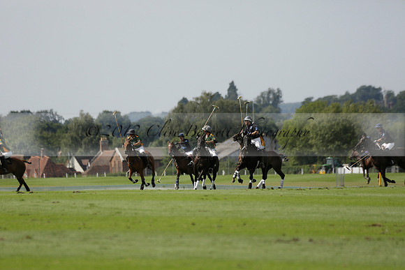 Maiz Dulce (green) v River (blue) in a Uber Polo Midsummer 12 goal polo match on Wednesday 21 August 2013 at Cowdray park Polo Club on Ambersham 2.  www.polopictures.co.uk