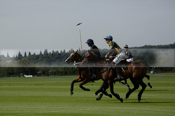 Maiz Dulce (green) v River (blue) in a Uber Polo Midsummer 12 goal polo match on Wednesday 21 August 2013 at Cowdray park Polo Club on Ambersham 2.  www.polopictures.co.uk