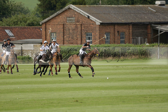 Beau Design v Boscom in an August Rother Cup 4 goal polo match at Cowdray Park Polo Club on Wednesday 07 August 2013