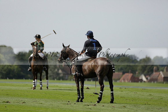 Maiz Dulce (green) v River (blue) in a Uber Polo Midsummer 12 goal polo match on Wednesday 21 August 2013 at Cowdray park Polo Club on Ambersham 2.  www.polopictures.co.uk