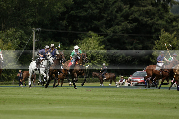Burningfold (blue) v Wairakei Pastoral (green) in the Ruins Cup Final on Sunday 04 August 2013.