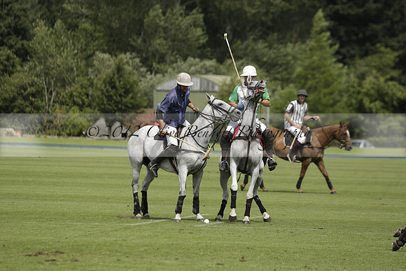 Burningfold (blue) v Wairakei Pastoral (green) in the Ruins Cup Final on Sunday 04 August 2013.