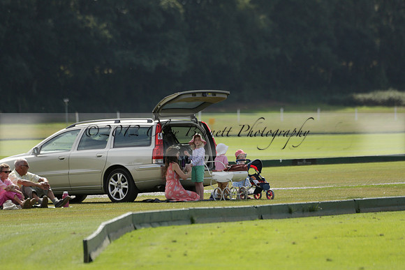 Maiz Dulce (green) v River (blue) in a Uber Polo Midsummer 12 goal polo match on Wednesday 21 August 2013 at Cowdray park Polo Club on Ambersham 2.  www.polopictures.co.uk