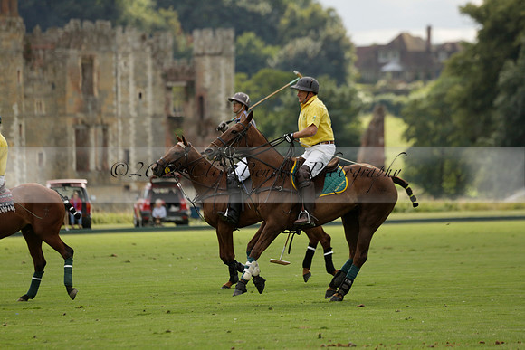 La Tremenda (lilac) v Maiz Dulce (yellow) in a Brecknock Cup polo match played on Lawns 1 at the Cowdray Park Polo Club on Tuesday 13 August 2013